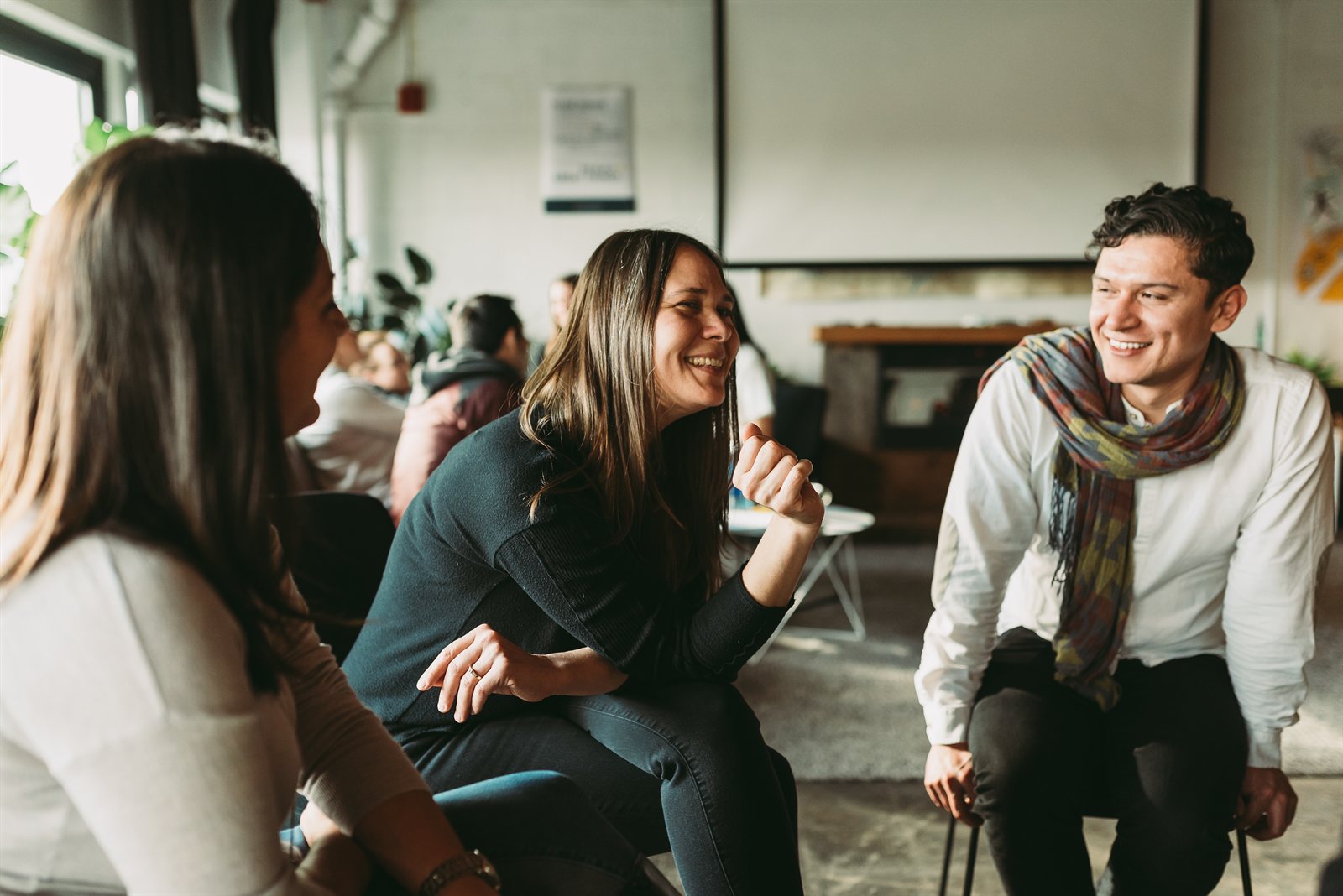 A small-group HumanSide workshop in discussion