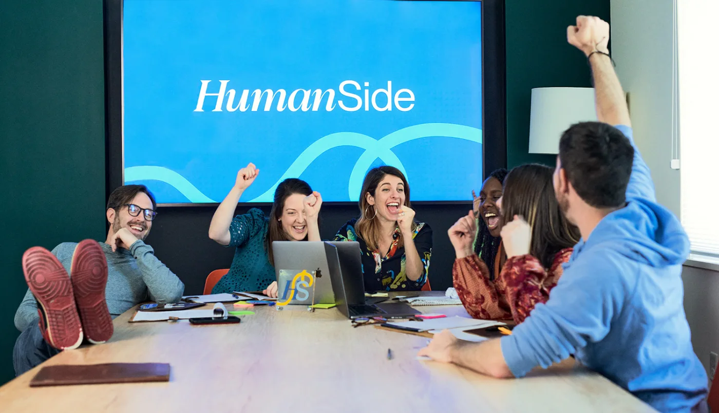 HumanSide participants celebrating in a live session